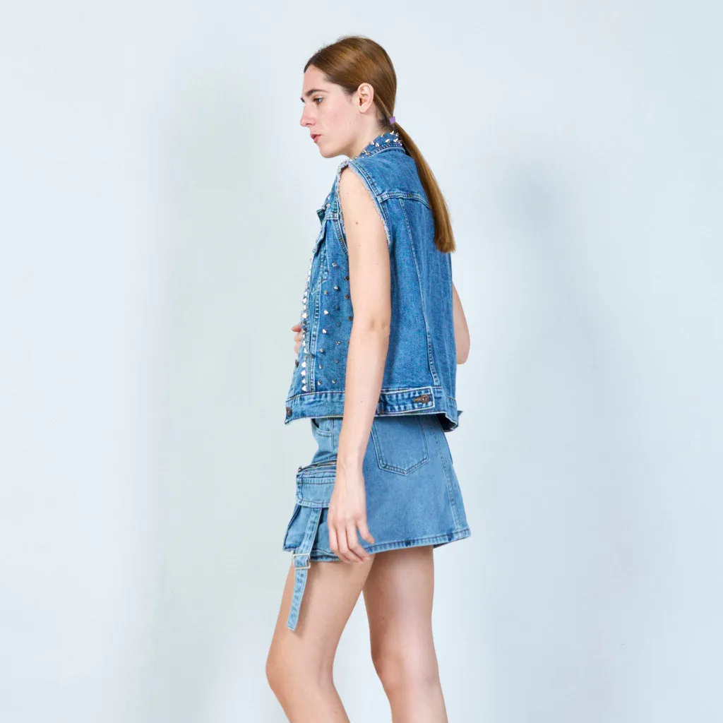 Distressed sleeveless denim jacket with stud embellishments wholesale